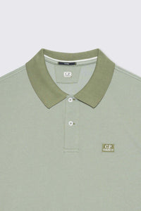 Cp Company Tacting Piquet Logo Polo Shirt In Bronze Green