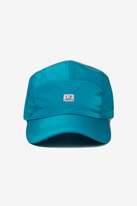 Cp Company Flatt Nylon 5 Panel Patch Logo Cap In Tile Blue