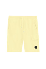 Load image into Gallery viewer, Cp Company Resist Dyed Lens Fleece Shorts In Pastel Yellow
